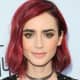 Lily Collins: Blunt bob with wine-red hair.